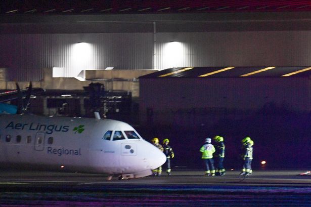 BREAKING: Belfast airport: Plane crash lands as landing gear collapses whilst 82mph winds batter UK