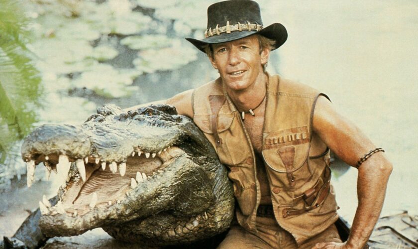 Paul Hogan with the famous croc. Pic: Paramount/Everett/Shutterstock