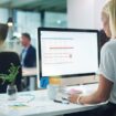 Cropped shot of a group of businesspeople working in the office