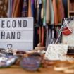 Close up on sign with inscription Second Hand and jewellery case with vintage accessories at thrift store checkout, copy space Pic: iStock