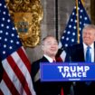 PALM BEACH, FLORIDA - DECEMBER 16: SoftBank CEO Masayoshi Son (C), accompanied by U.S. President-elect Donald Trump (R) and Trump's choice for Secretary of Commerce, Cantor Fitzgerald Chairman and CEO Howard Lutnick (L), speaks at a news conference at Trump's Mar-a-Lago resort on December 16, 2024 in Palm Beach, Florida. In a news conference that went over an hour, Trump announced that SoftBank will invest over $100 billion in projects in the United States including 100,000 artificial intelligence related jobs and then took questions on Syria, Israel, Ukraine, the economy, cabinet picks, and many other topics. Andrew Harnik/Getty Images/AFP (Photo by Andrew Harnik / GETTY IMAGES NORTH AMERICA / Getty Images via AFP)