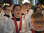 Girls to sing at St Paul's Cathedral's Christmas Day service for the first time ever: Young choristers snapped preparing for their big day