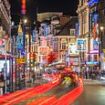 Man is arrested for attempted murder as car rams into Shaftesbury Avenue crowd on Christmas Day leaving four injured including one who is fighting for life 'after nightclub bust-up'