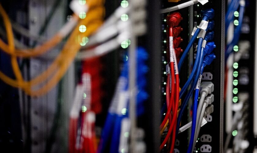 Interior of a server room in the American the Internet connection and data center company Equinix in Amsterdam on July 14, 2021. (Photo by Sem van der Wal / ANP / AFP) / Netherlands OUT