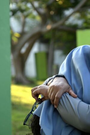 Women comfort each other as they visit a mass grave of victims of the 2004 Indian Ocean tsunami in Banda Aceh, Indonesia. Pic: AP