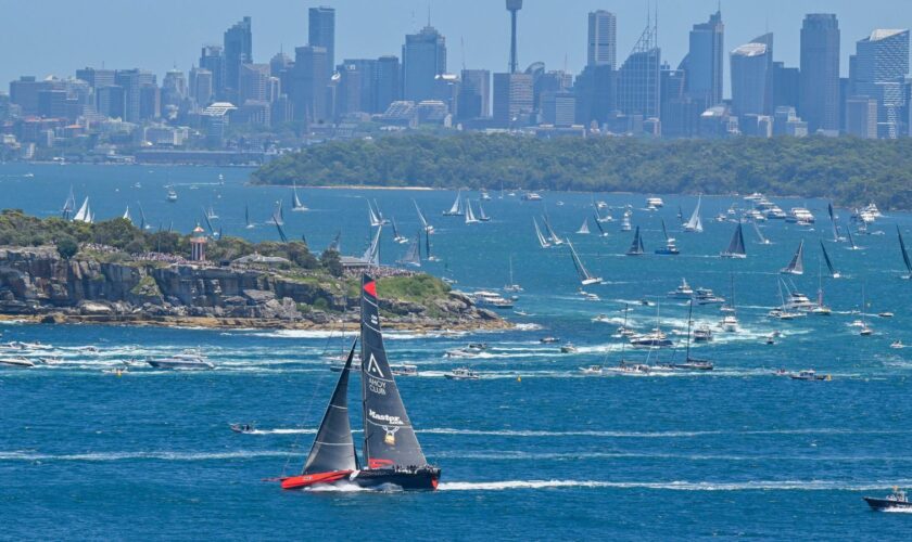 Yachts set off from Sydney Harbour to start the Sydney to Hobart yacht race. Pic: AP