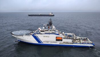 Finnish Border Guard's ship Turva and oil tanker Eagle S sail on the sea outside the Porkkalanniemi, Finland on December 26, 2024. RAJAVARTIOSTO-Finnish Border Guard/LEHTIKUVA/HANDOUT via REUTERS. ATTENTION EDITORS - THIS IMAGE WAS PROVIDED BY A THIRD PARTY. NO THIRD PARTY SALES. NOT FOR USE BY REUTERS THIRD PARTY DISTRIBUTORS. FINLAND OUT. NO COMMERCIAL OR EDITORIAL SALES IN FINLAND.