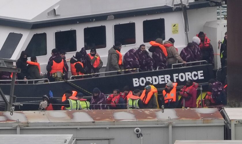 A group of people thought to be migrants are brought in to Dover, Kent, from a Border Force vessel following a small boat incident in the Channel. Picture date: Thursday December 26, 2024. Gareth Fuller/PA Wire