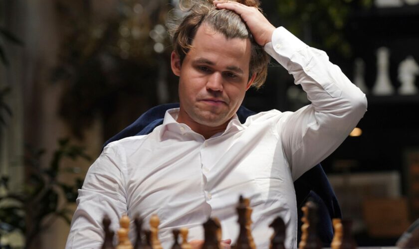 World chess number one quits tournament after refusing to change jeans