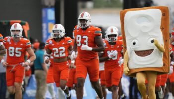 Miami teammates fight on sideline during Pop-Tarts Bowl