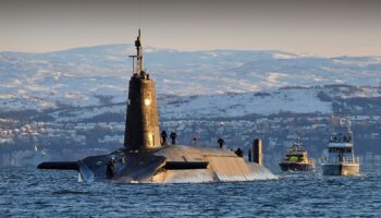 A Vanguard-class submarine – fitted with Glasgow-made optronic masts – arriving back at HM Naval Base Clyde, Faslane, following a patrol. Pic: Open Government License