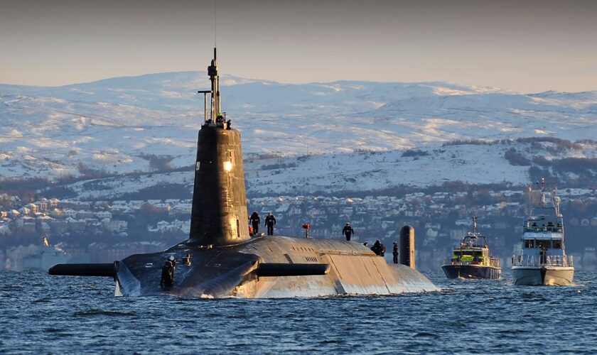 A Vanguard-class submarine – fitted with Glasgow-made optronic masts – arriving back at HM Naval Base Clyde, Faslane, following a patrol. Pic: Open Government License