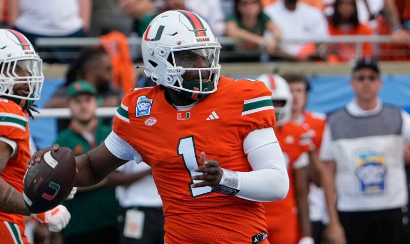 Miami's Cam Ward opts out of bowl game in 2nd half after setting TD record, ignites social media debate