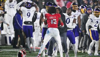 East Carolina-NC State fight mars end of Military Bowl, ref left bloodied