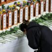 A woman prays at a memorial altar for the victims of the Jeju Air crash. REUTERS/Kim Hong-ji