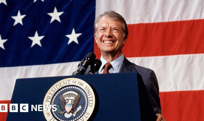 Biden and Trump lead tributes to 'extraordinary' Jimmy Carter after he dies aged 100