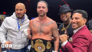 Paul Bamba poses for a photo with manager Ne-Yo after winning the WBA Gold Cruiserweight title