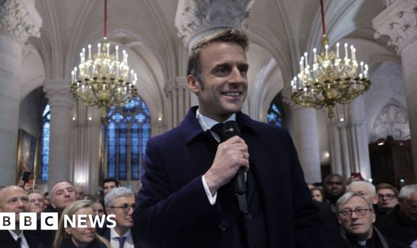 Embattled Macron seeks boost from Notre Dame reopening