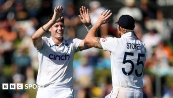 England bowler Matthew Potts (left) celebrates taking a wicket with captain Ben Stokes (right)