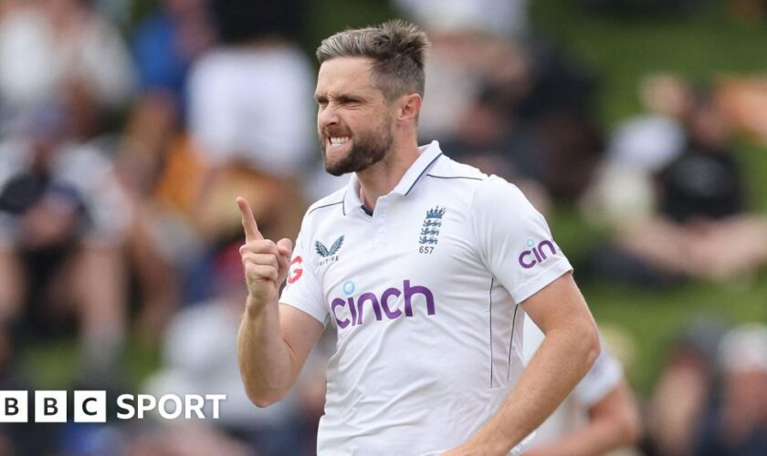 Chris Woakes celebrates a wicket