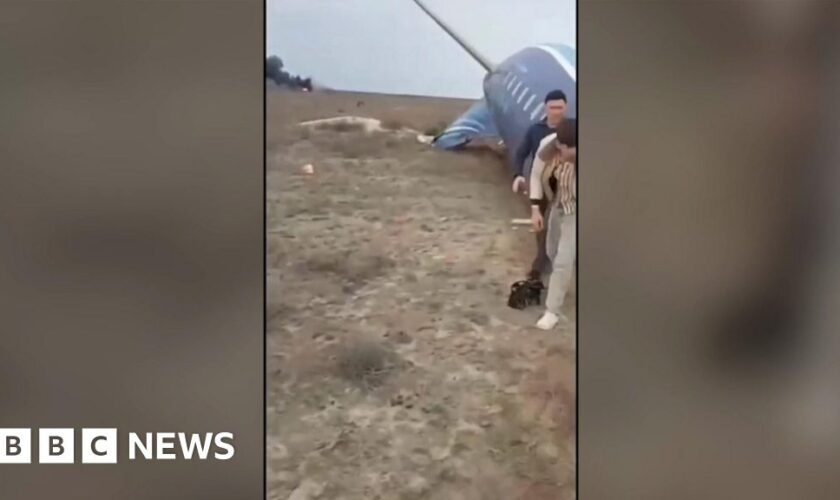 Footage shows survivors walking from crashed Azerbaijani plane