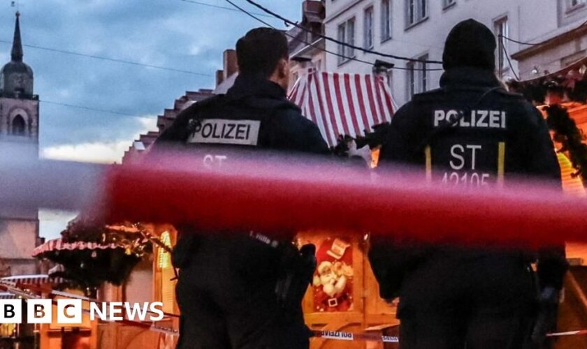 German police probe market attack security and warnings about suspect