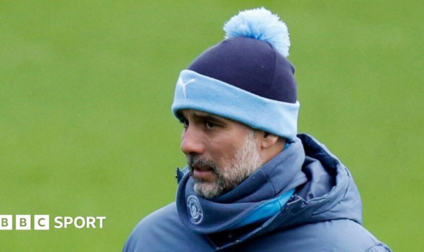 Coach Pep Guardiola at a Manchester City training session