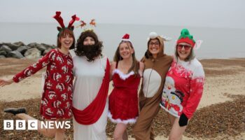 Hundreds of swimmers take Christmas Day North Sea dip