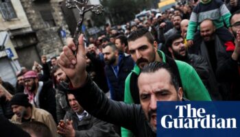 Hundreds protest in Christian areas of Syrian capital after Christmas tree burned