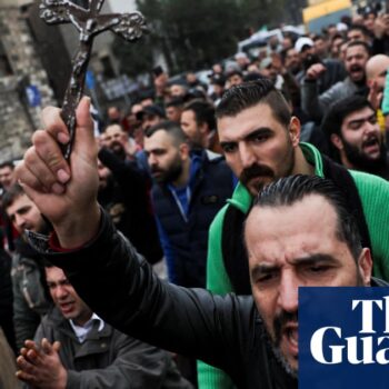 Hundreds protest in Christian areas of Syrian capital after Christmas tree burned