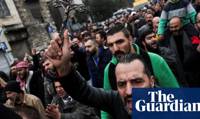 Hundreds protest in Christian areas of Syrian capital after Christmas tree burned