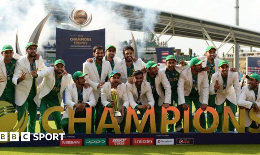 Pakistan celebrate with the trophy after winning the ICC Champions Trophy final.