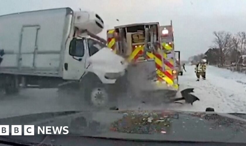 Incredible escape as lorry smashes fire truck on icy US highway