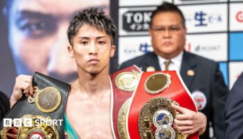 Naoya Inoue with his belts