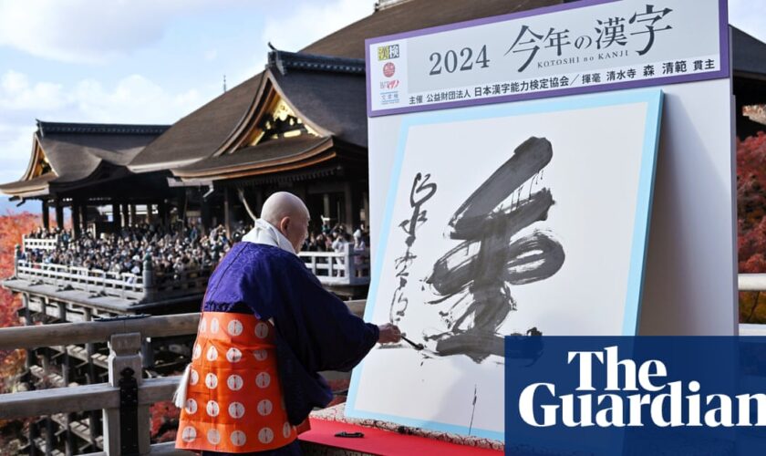 Japan chooses ‘gold’ as kanji of the year in nod to Olympics glory – and slush fund politics