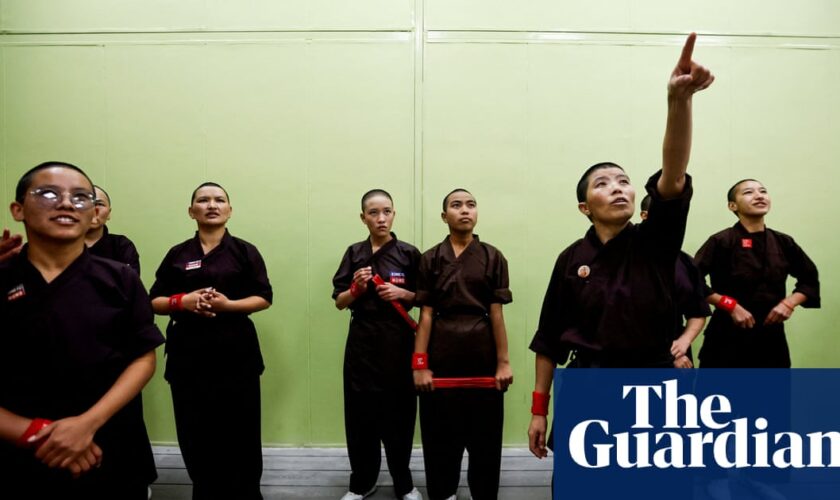 Kung fu nuns show off martial art skills at monastery reopening in Nepal