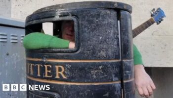 Meet the man who busks from inside a litter bin