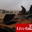 Middle East crisis live: 14 security personnel killed in Syria after clash over former prison officer