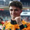 Lando Norris smiles and clenches his fist in celebration after qualifying on pole for the Abu Dhabi Grand Prix