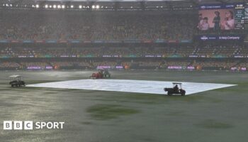 A general view of Gabba as the outfield is covered in puddles