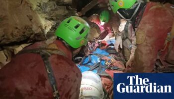 Rescuers work to save Italian caver trapped 585m underground