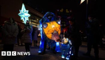 Riot-hit library lights up in march to mark relaunch