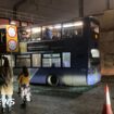 Roof torn off bus after railway bridge crash