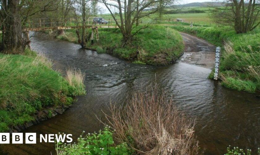 Search for missing man near ford flooded in storm