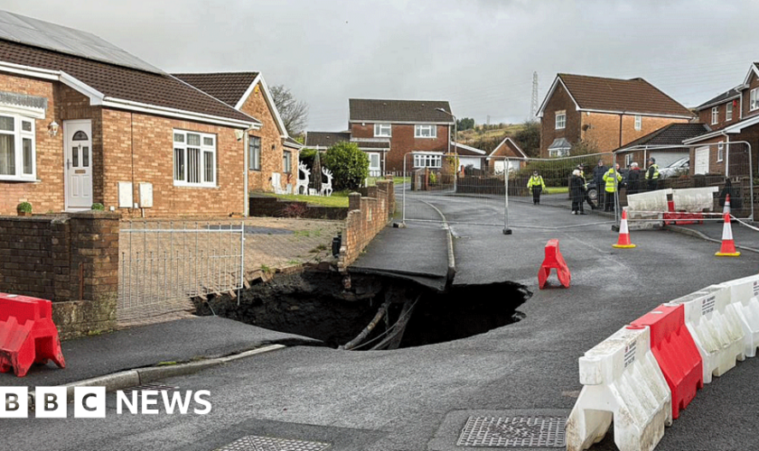 Sinkhole gets bigger as storm delays homecoming