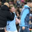 Manchester City's Kevin de Bruyne is hugged by manager Pep Guardiola after being substituted during the 3-0 win against Nottingham Forest