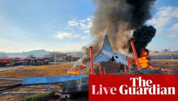 South Korea plane crash: all except two are presumed dead on Jeju Air flight carrying 181 people, say authorities – live updates