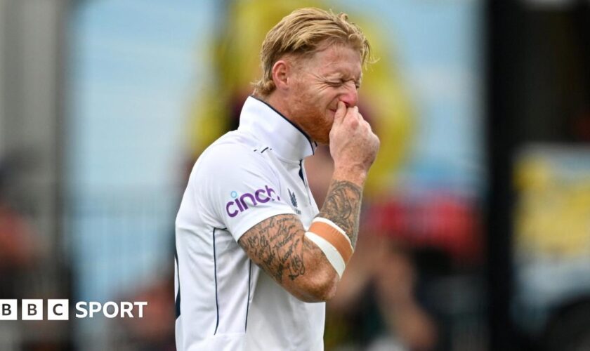 England captain Ben Stokes grimaces as he limps off the field injured