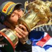 Lewis Hamilton kisses the trophy after winning the British Grand Prix