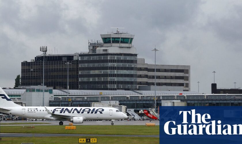 Two men charged over Manchester airport disturbance involving police